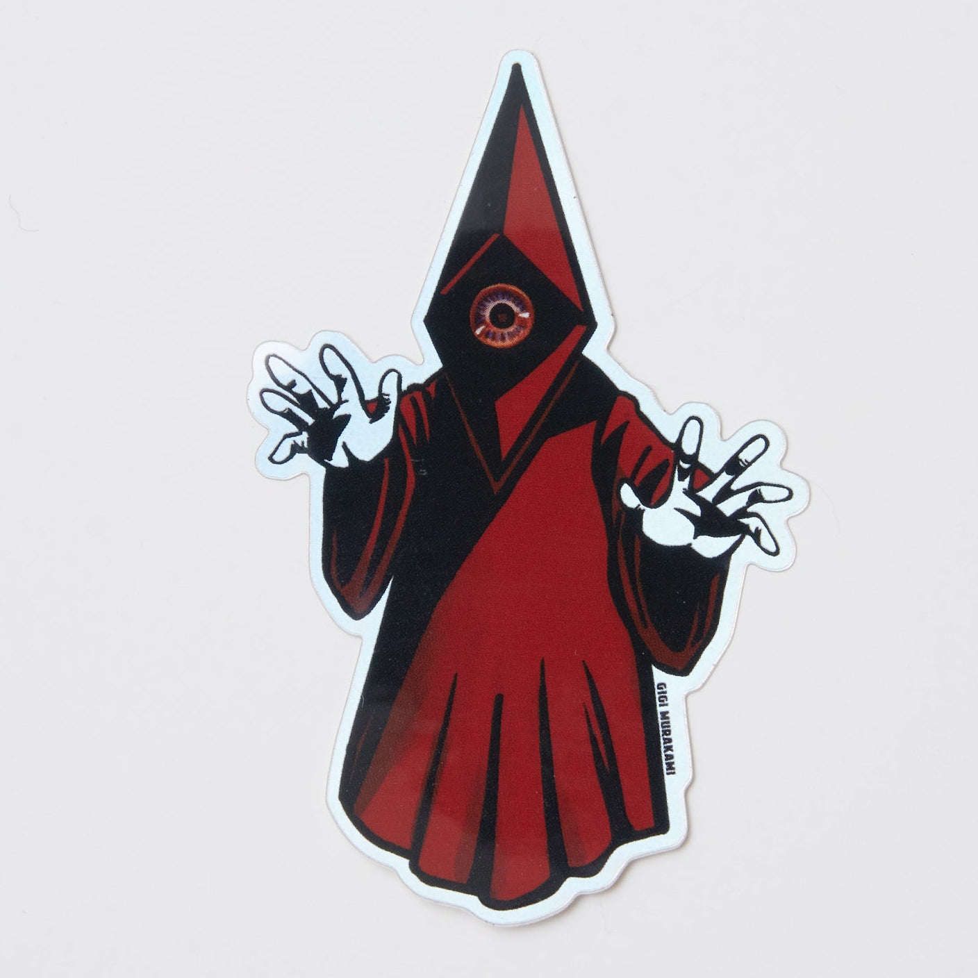 Sticker of a character in a red robe with a pointed hood on a light gray background